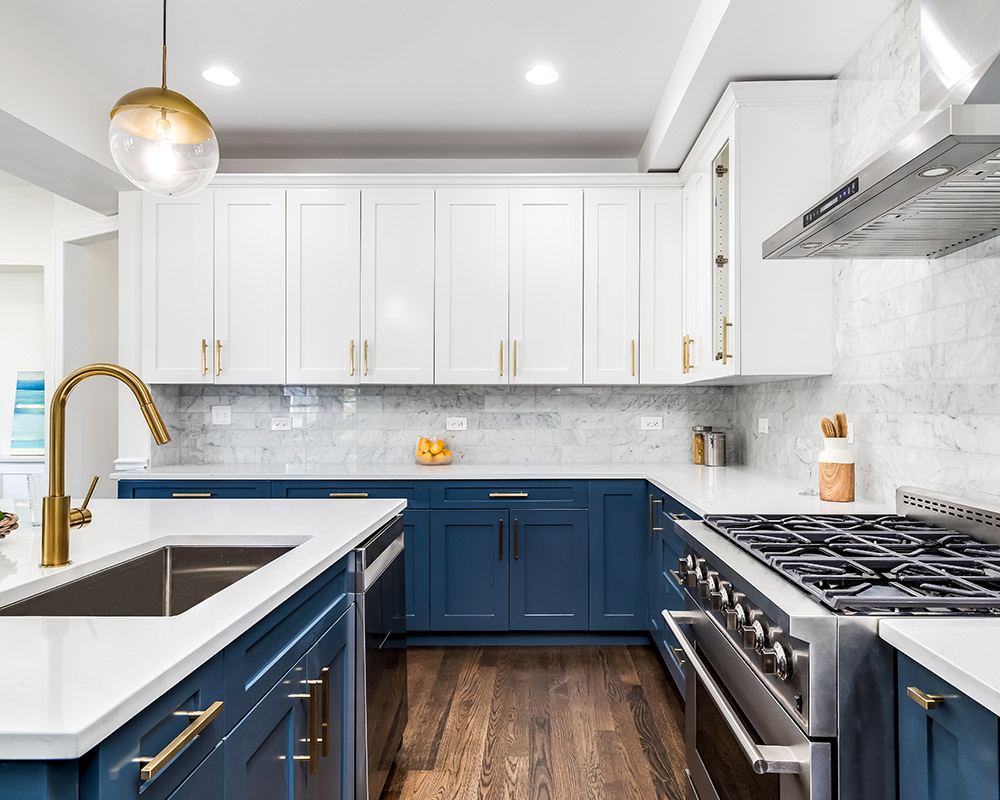 kitchen interiors with white and blue cabinets installed kenner la